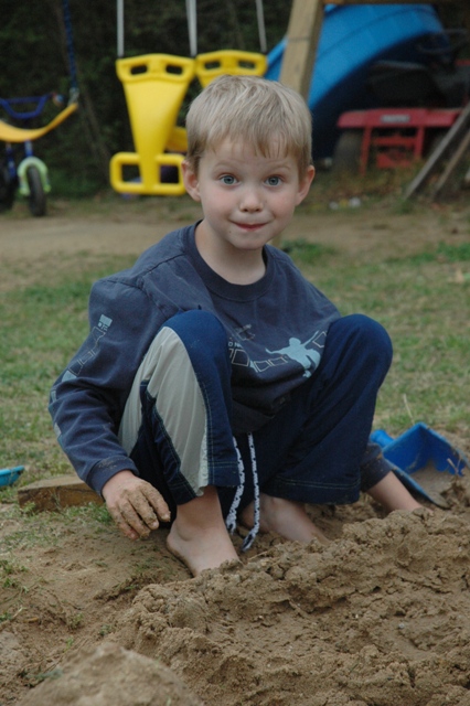 titus-playing-in-sand